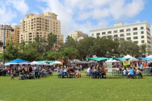 Photo of green market, building and trees